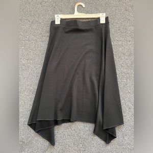Women’s 3sixty asymmetrical knee length skirt size M. Never worn.